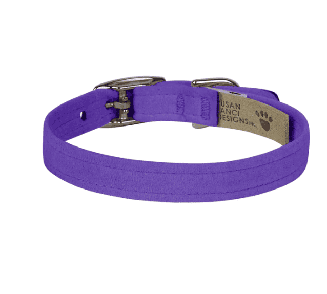 A leash for small dogs in vibrant purple color, made of durable fabric with metal clasp for secure attachment, ideal for stylish and safe walks.